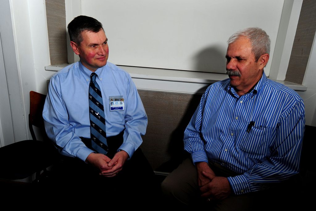 A chaplain speaks with a patient at the Ralph H. Johnson Veterans Affairs Medical Center.